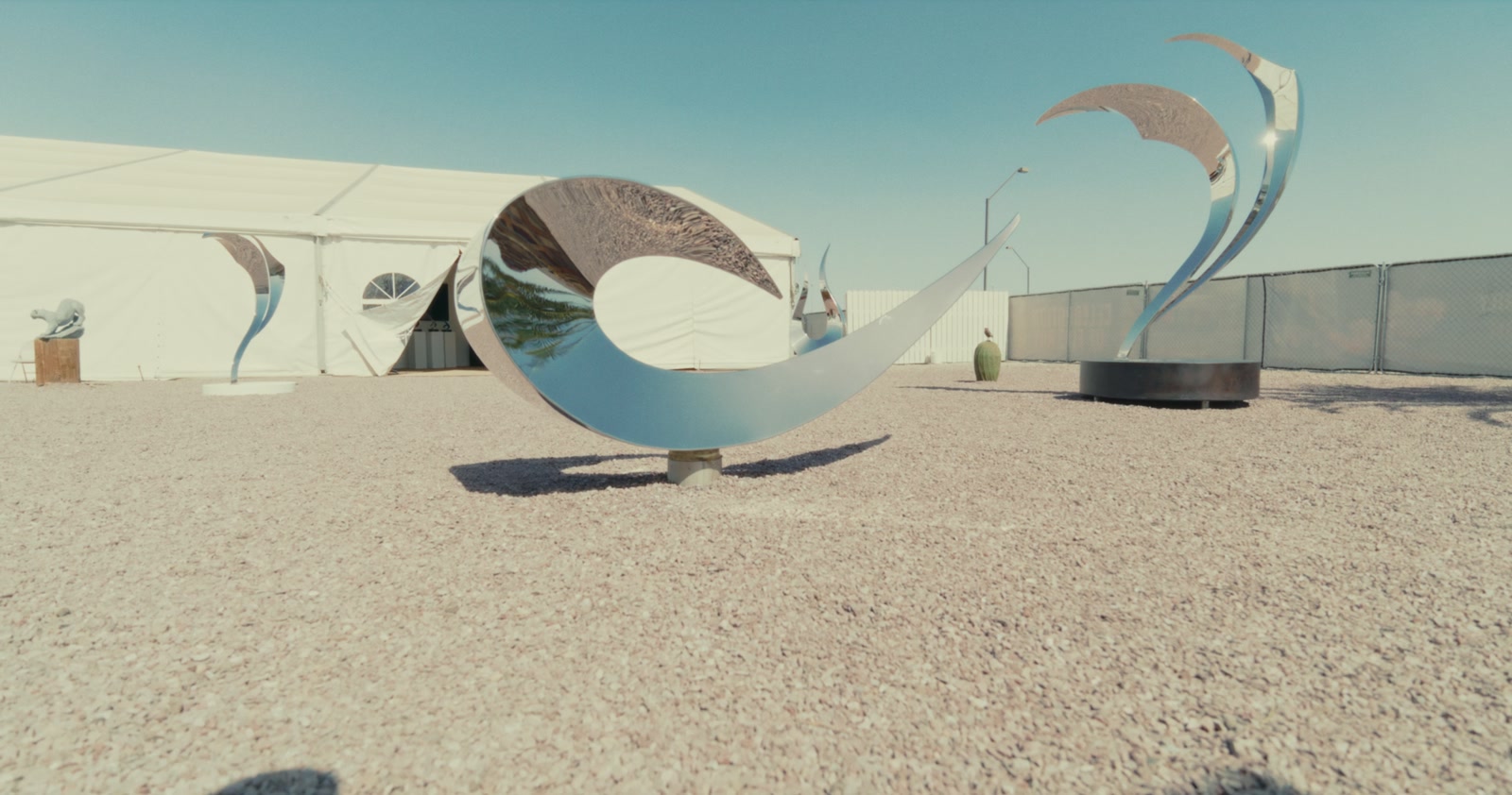 Polished outdoor sculptures in the sunny sculpture courtyard